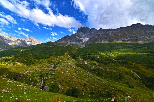 The mesmerizing views of the green landscapes against the cloudy sky in spring