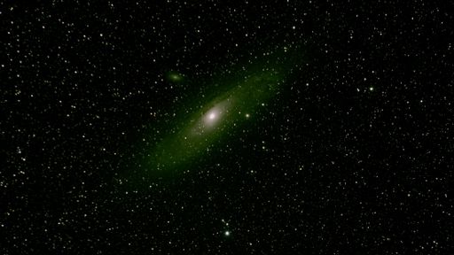 A beautiful shot of the Andromeda galaxy in a starry night sky