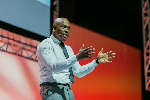 Johannesburg, South Africa - August 21, 2018: Entrepreneur and speaker Vusi Thembekwayo live on stage at Think Sales Convention