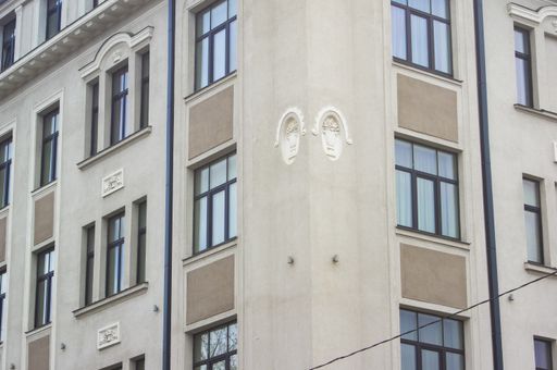 A closeup shot of a building's facade on a gloomy day
