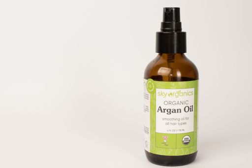 A closeup of a bottle of Argan Oil used for face, skin and hair care