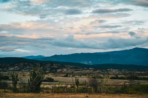 A valley under the cloudy sunset sky at the Tatacoa Desert, Colombia