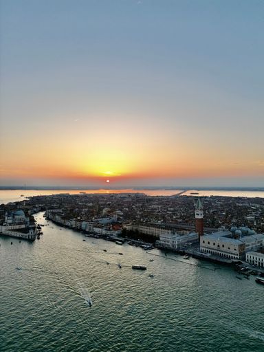 An aerial view of beautiful Venice at vibrant sunset