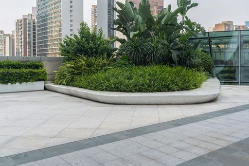 empty concrete floor in front of modern buildings in the downtown street.copy space for car advertisement.