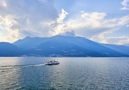 A beautiful shot of a sunset sky over Lake Como and nearby mountains