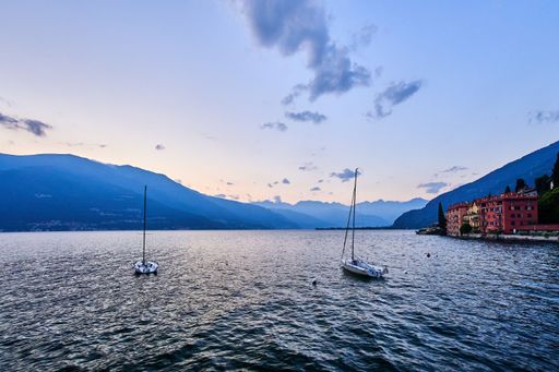 A beautiful shot of a sunset sky over Lake Como and nearby mountains