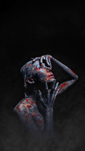 Halloween poster and wallpaper of woman with fantasy scary creepy makeup of bloody devil in misty darkness