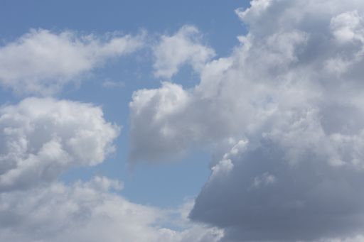 A natural view of cotton-like clouds on a blue sky background