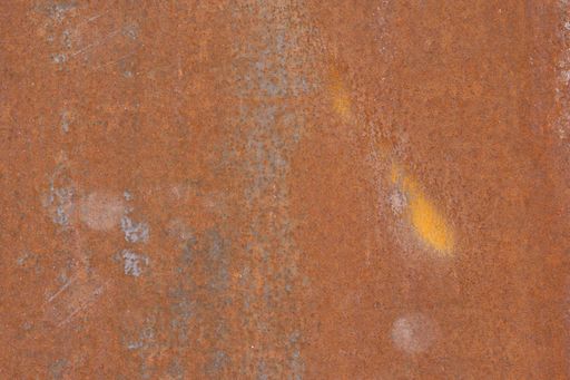 A closeup shot of a grungy brown rustic surface