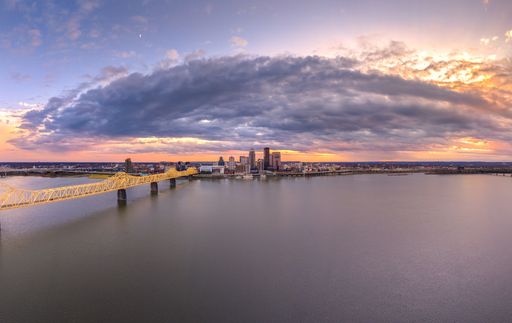 An aerial panoramic shot of Louisville, Kentucky at sunset.