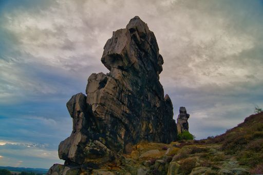 A dramatic sunrise view at the Devil's Wall, a rock formation located in Thale, Germany.
