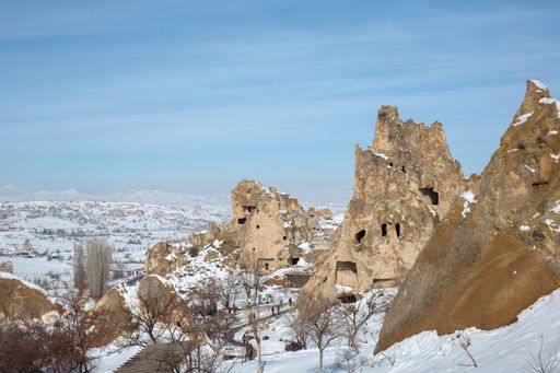 A beautiful shot of the fairy chimneys and the Goreme Open Air Museum in Cappadocia on a snowy day