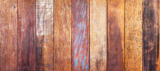 A close-up, top view of a wooden table perfect for backgrounds