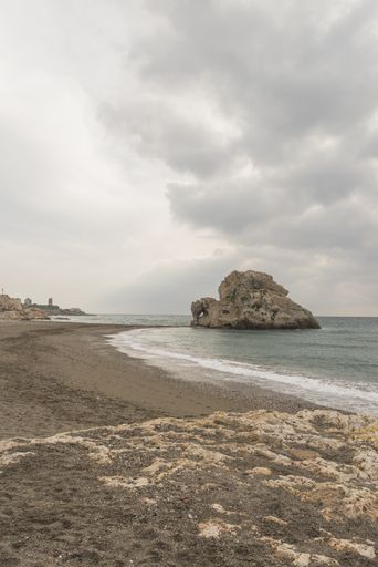 A vertical shot of the calm beach in Malaga, Andalucia, Spain during daylight