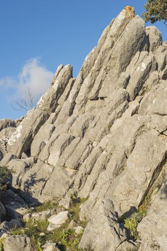 A big rock against u blue sky background in Sierra de las Nieves Natural Park, Malaga, Spain