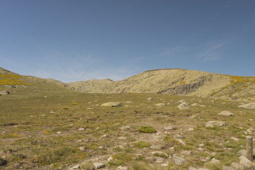 The grass-covered hills and fields in the Regional of Gredos, Spain
