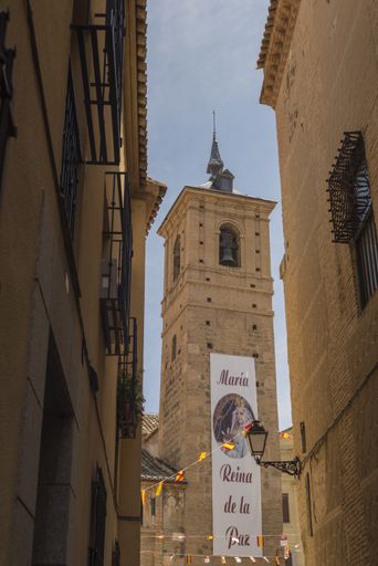 a vertical shot of a building with writing in Toledo Spain - Maria queen of peace