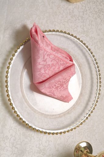 Wedding Decoration on the decorated table with golden glasses ear rings fruits on the tables decorated with plates