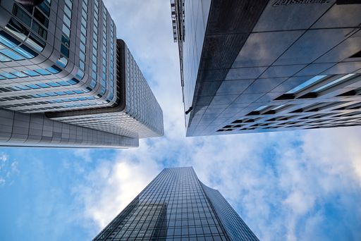 A low angle of modern skyscrapers against the sky in Frankfurt, Germany