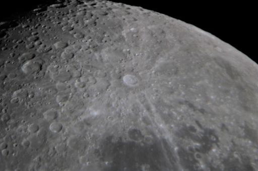 Closeup of the moon: eye piece projection with a Canon dslr on an 8 inch Newtonian telescope. Tycho and other craters are clearly visible.