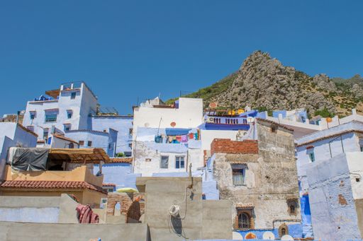 Part of the medina of Chefchaouen, the old town, with blue buildings and doors, in the Rif mountains. Urban tourist centre in rural environment