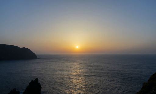 A scenic view of beautiful sunset over the Atlantic sea