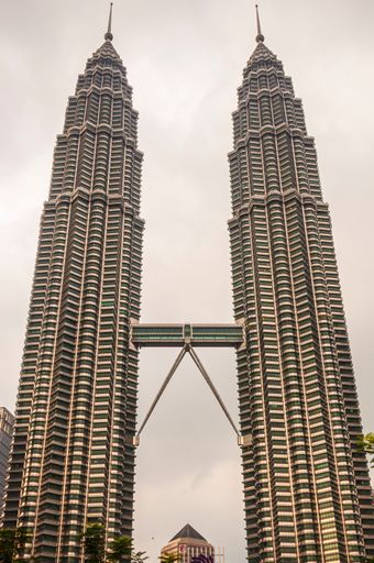 A vertical shot of Petronas twin towers in Malaysia, Asia  KLCC Park Kuala Malaysia