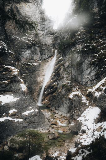 A beautiful scenery of a powerful waterfall flowing through rocky cliffs in Germany
