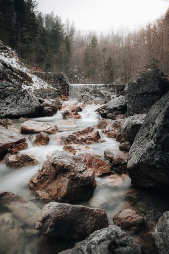 A beautiful scenery of a powerful waterfall flowing through rocky cliffs in Germany