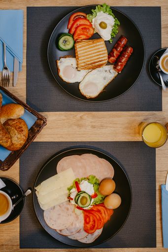 A top view of healthy delicious breakfast served on the table in the cafe