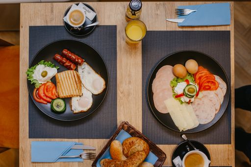 A top view of healthy delicious breakfast served on the table in the cafe