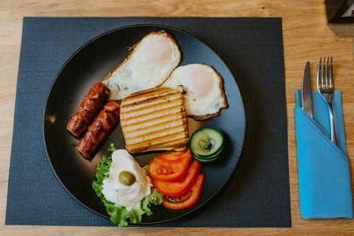 The healthy delicious breakfast served on the table in the cafe