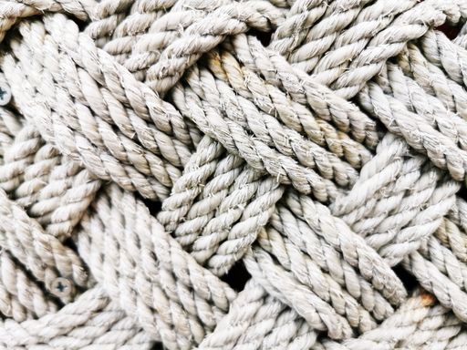 A closeup shot of interwoven wool ropes