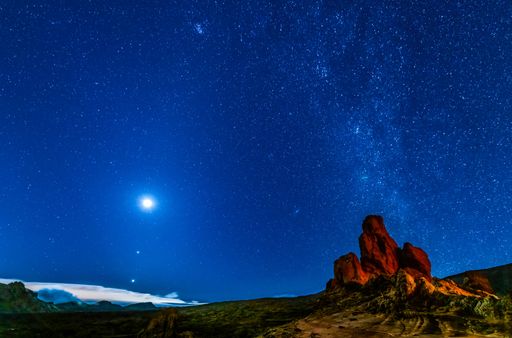An aerial view of The conjunction of Jupiter and Venus and the Andromeda Galaxy, seen from Mount Teide National Park, Tenerife.