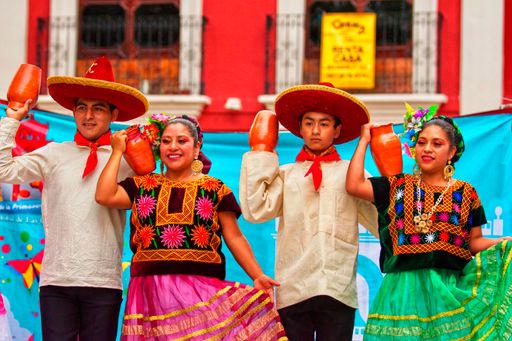 Different dancers performing local dances from different states of Mexico during Semana Santa (Easter) in San Cristobal de las Casas, México.