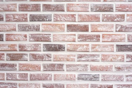 A closeup shot of a textured brick wall background