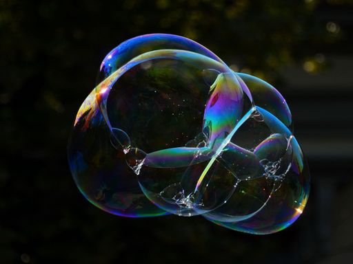 The colorful soap bubbles floating in the air