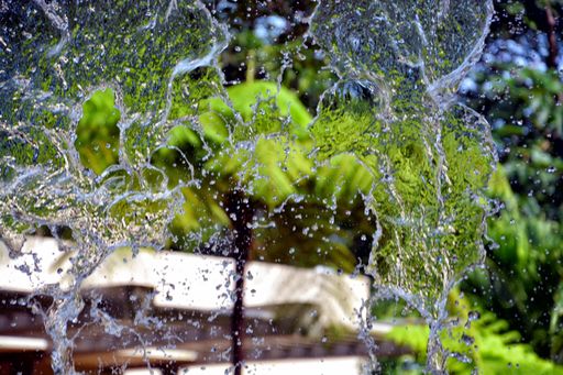 The moment of water spilling from small waterfall, Puerto Rico