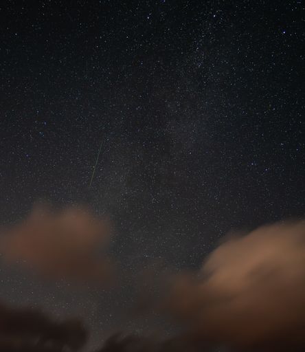 An awe-inspiring view of the Milky Way illuminated in the night sky with the Neowise meteor shower
