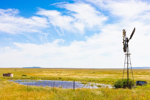 A Windmill Windpump on a farm in rural grassland area of South Africa