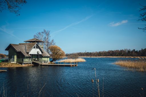 The fisherman house by the lake with boat platform