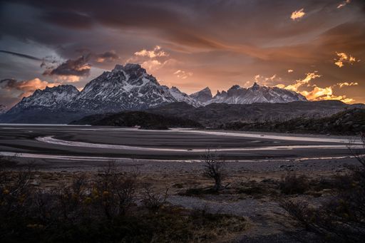 The majestic mountain range and lake in Torres del Paine national park, Chile at sunset