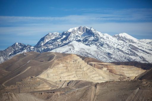 A beautiful shot of mountains under a blue sky