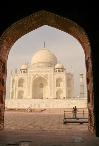 The mesmerizing Taj Mahal through the arch in Agra, India