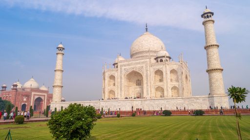 Taj Mahal is an ivory-white marble mausoleum in Agra, a UNESCO World Heritage Site. The jewel of Muslim Mughal art architecture in