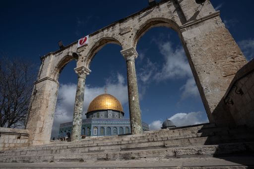 An archway in front of the Dome of the Rock in Jerusalem
