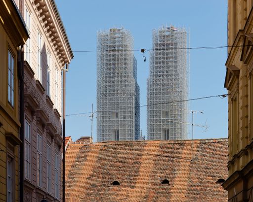 A closeup of tall Zagreb Cathedral under renovation in  Zagreb, Croatia