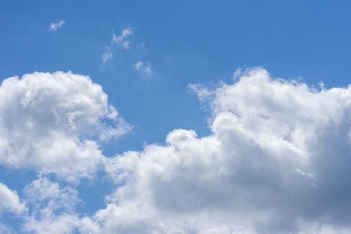 A natural view of cotton-like clouds in the blue sky with copyspace