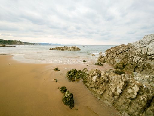 A closeup shot of Sopelana beach on the coast of Biscay in northern Spain