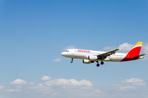 Iberia Airbus A320 plane landing at Barcelona airport